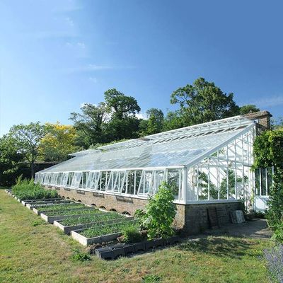 Un buen precio. Sistema Solar montada tejado del invernadero para las tierras de labrantío en línea